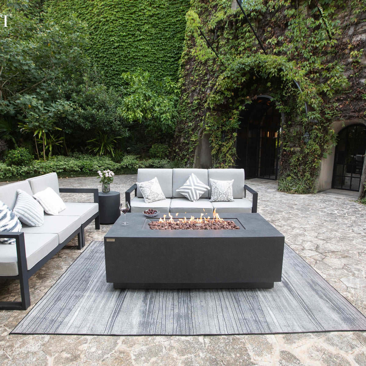 Elementi Andes Fire Table Dark Gray - Stone Courtyard Patio Setting with Modern Outdoor Sofa Set