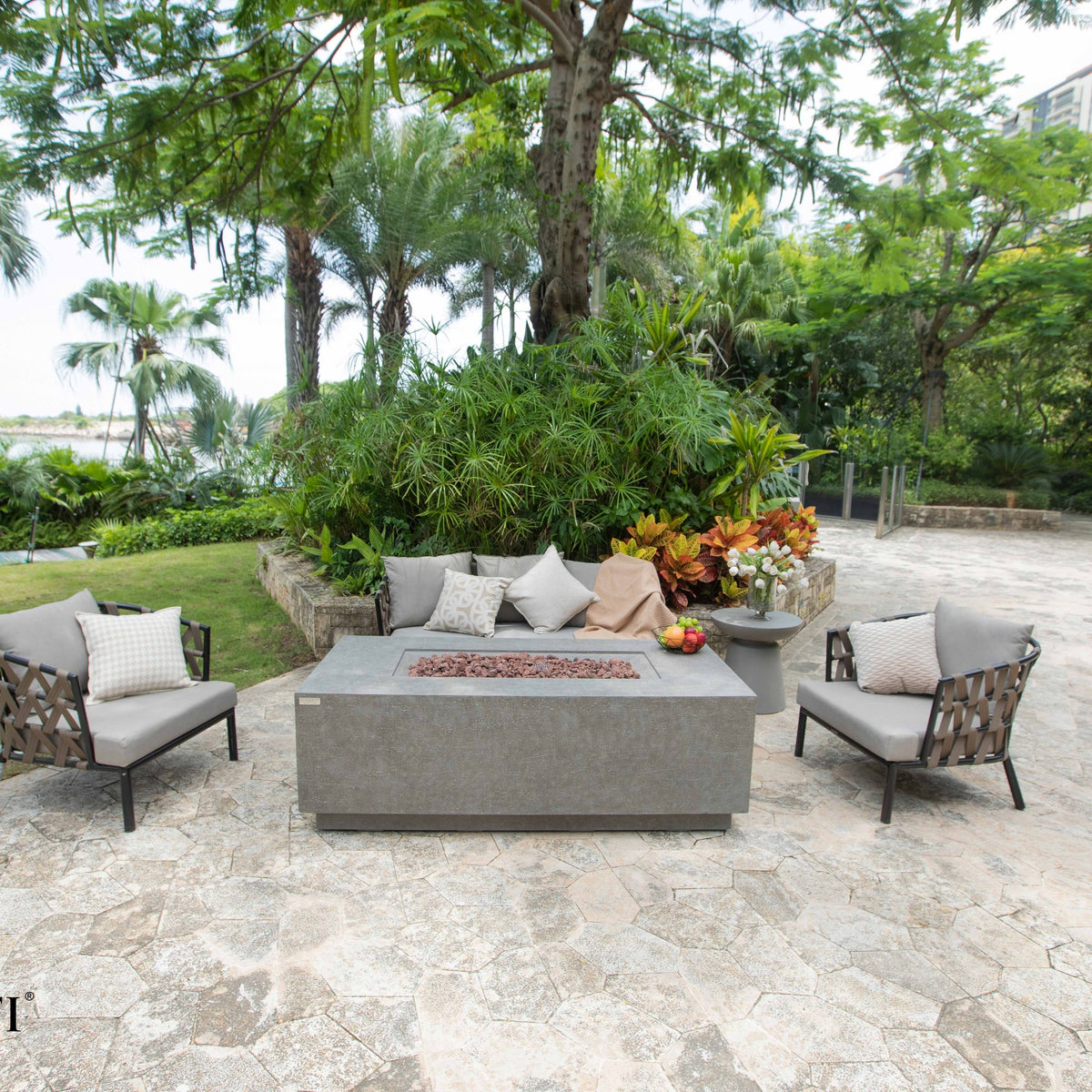Elementi Andes Fire Table Light Gray - Stone Terrace Patio Scene with Sofa and Club Armchairs