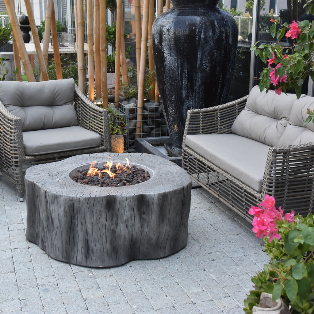 Elementi Manchester Fire Table - Classic Gray - Garden Terrace Living Scene with Outdoor Sofa
