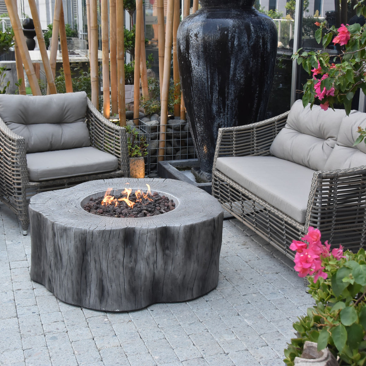 Elementi Manchester Fire Table - Classic Gray - Garden Terrace Living Scene with Outdoor Sofa