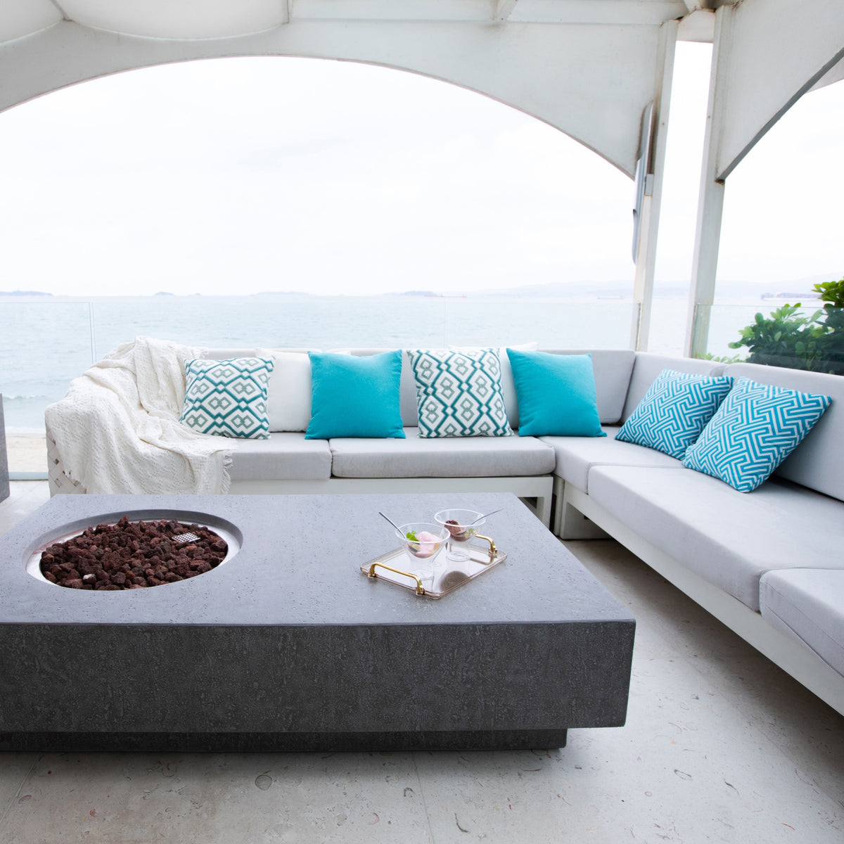 Elementi Metropolis Fire Table - Light Gray - Outdoor Patio Lounge Setup with Active Flame