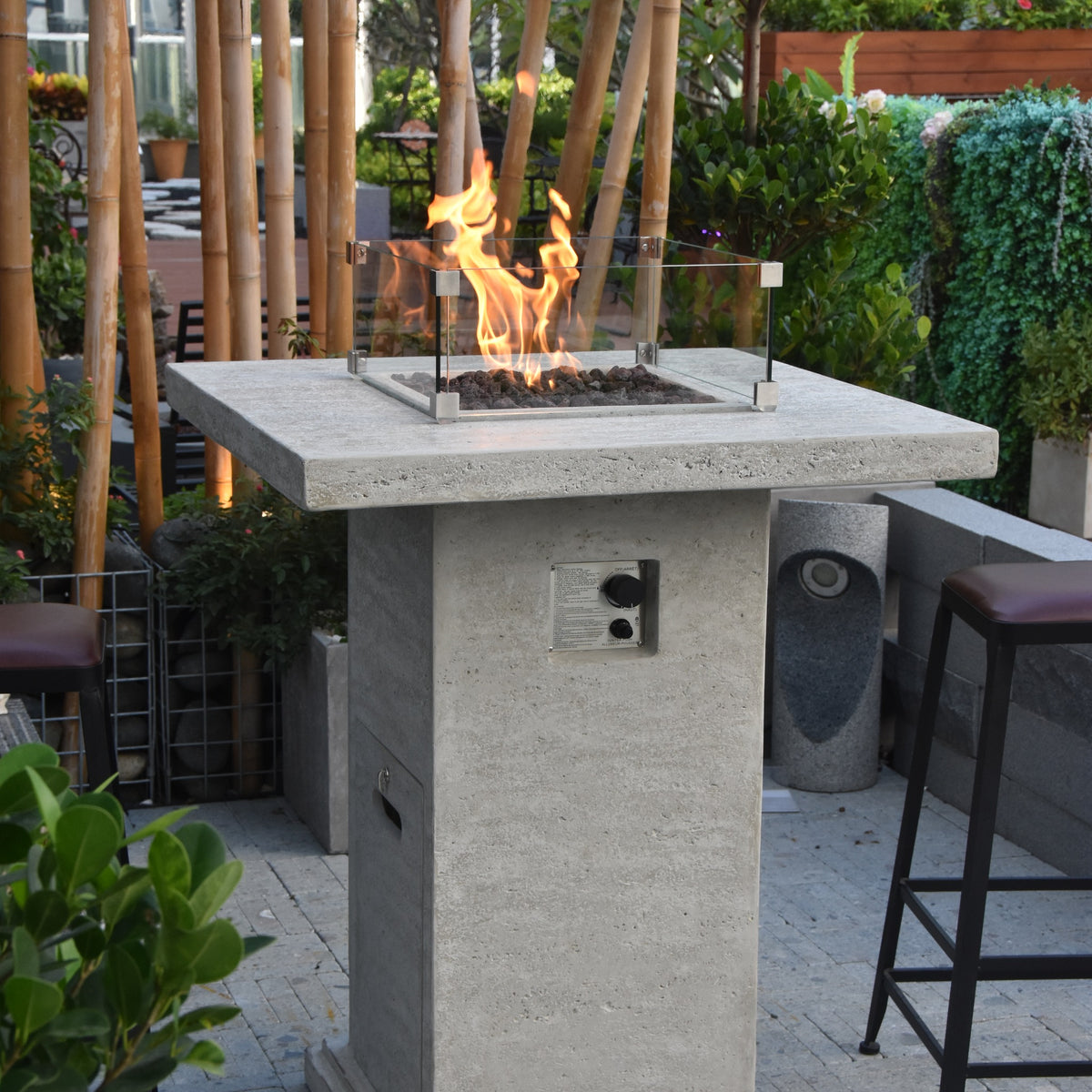 Elementi Montreal Bar Table - Outdoor Patio with Bar Stools & Bamboo Backdrop - Elementi Fires