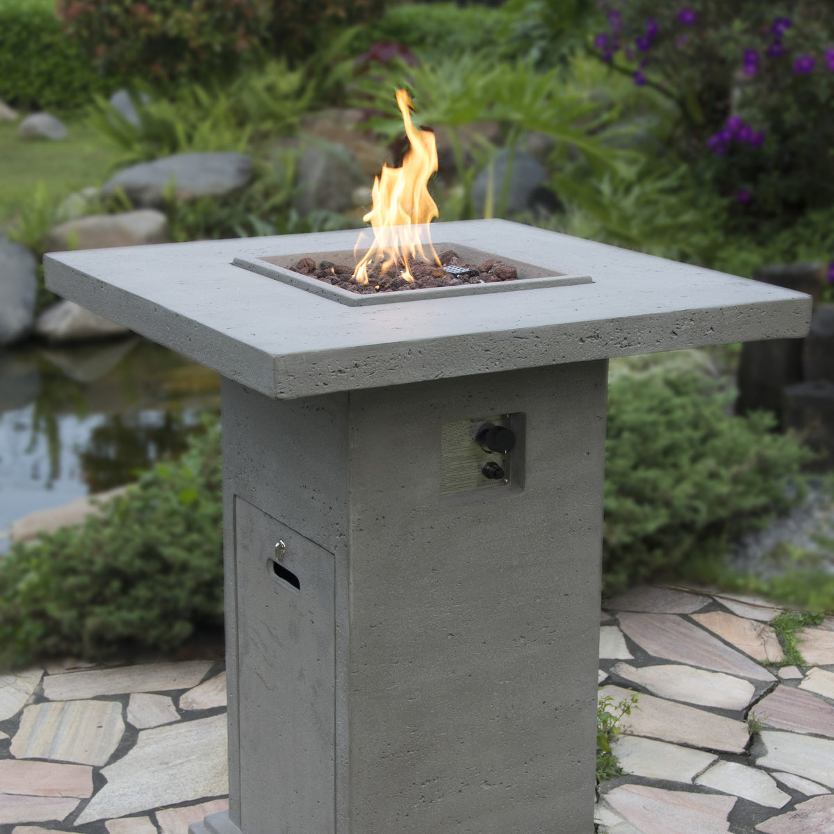 Elementi Montreal Bar Table - Natural Stone Terrace Evening Setting with Flame - Elementi Fires