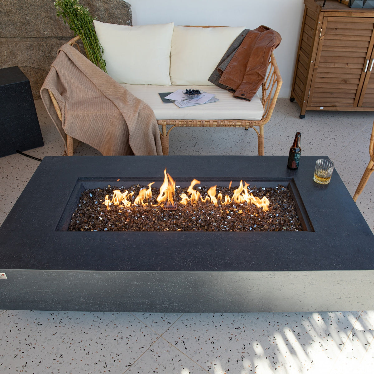Elementi Plus Positano Fire Table - Covered Patio Setting with Burning Linear Flames