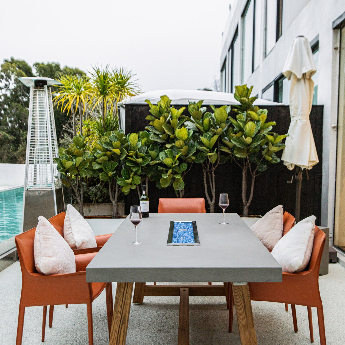 Elementi Sonoma Dining Fire Table - Daytime Poolside Patio Dining with Contemporary Chairs - Elementi Fires